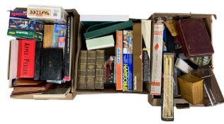 Quantity of vintage board games in two boxes together with box of cased cutlery