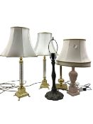 Pair of polished brass table lamps with glass stems