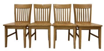 Set four light beech dining chairs