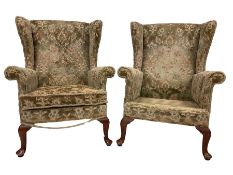 Parker Knoll - pair wingback armchairs upholstered in beige patterned fabric
