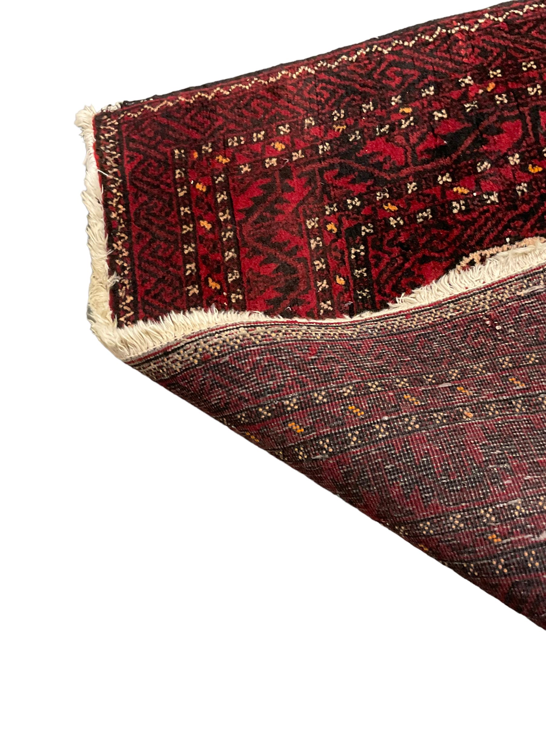 Persian indigo and dark rust ground rug - Image 7 of 7