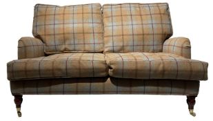 Howard design feather filled tartan pattern two seat sofa on Victorian style turned legs with castor