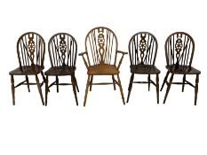 Set four mid-20th century beech dining chairs with wheel and stick backs