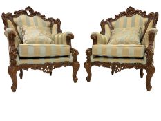 Pair Italian Rococo style carved walnut finish wingback armchairs