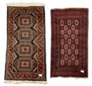 Persian indigo and dark rust ground rug