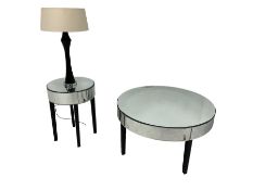 Circular mirrored coffee table fitted with single drawer on ebonised supports