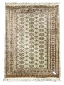 Persian Bokhara pale ground rug