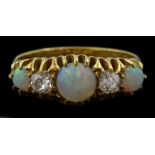 Early 20th century five stone opal and old cut diamond ring