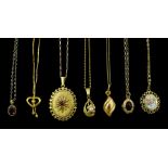 Seven 9ct gold pendant necklaces including garnet