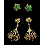 Pair of gold pendant stud earrings and a pair of gold emerald cluster stud earrings