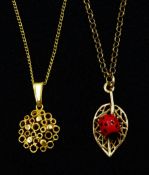 Gold ladybird on a leaf pendant necklace and a gold circular pendant necklace