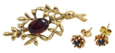 Gold garnet brooch and pair of gold garnet stud earrings