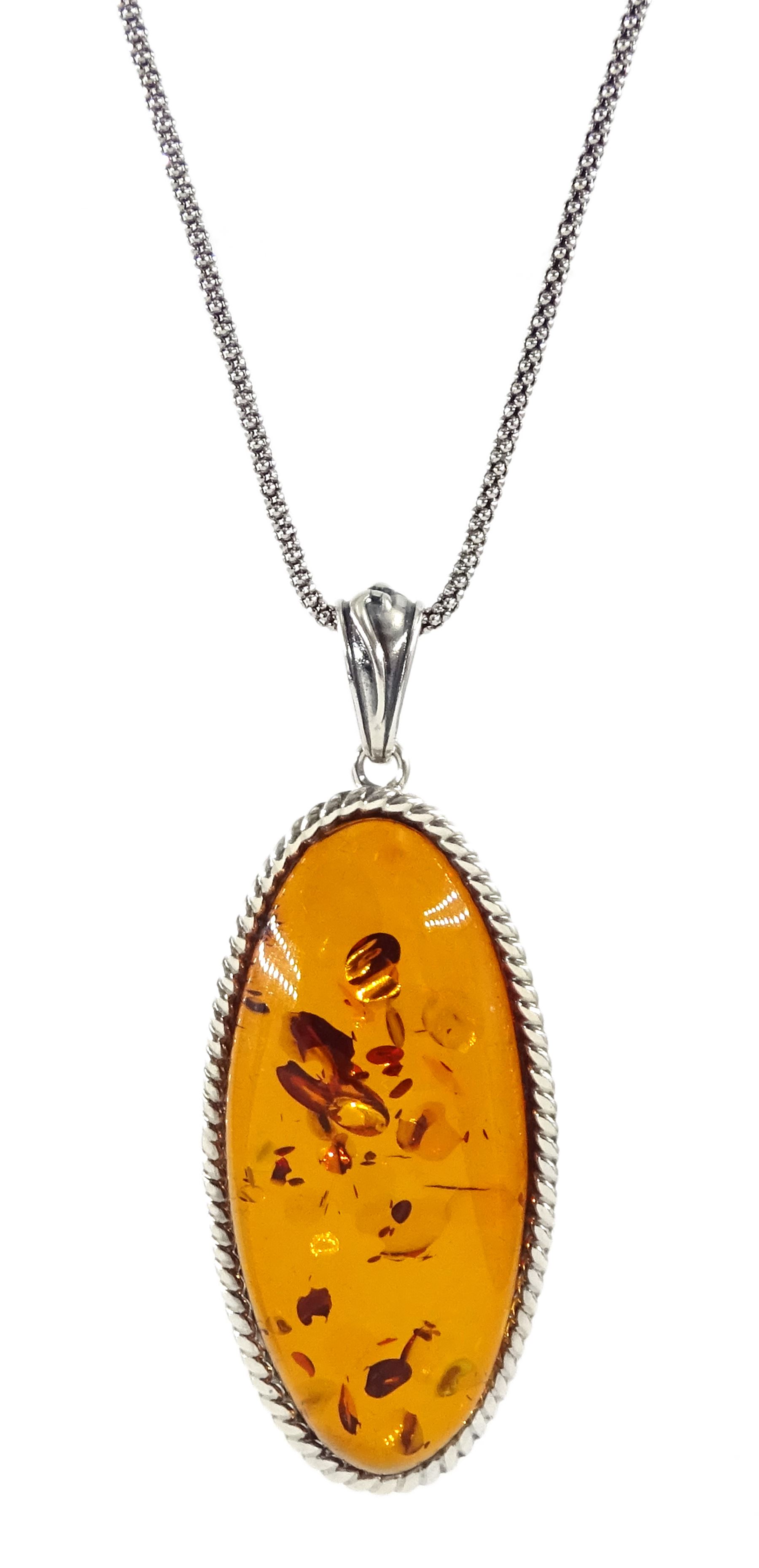 Silver Baltic amber oval pendant necklace