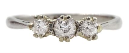 Platinum three stone old cut diamond ring