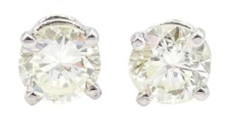 Pair of 18ct white gold round brilliant cut diamond screw back stud earrings