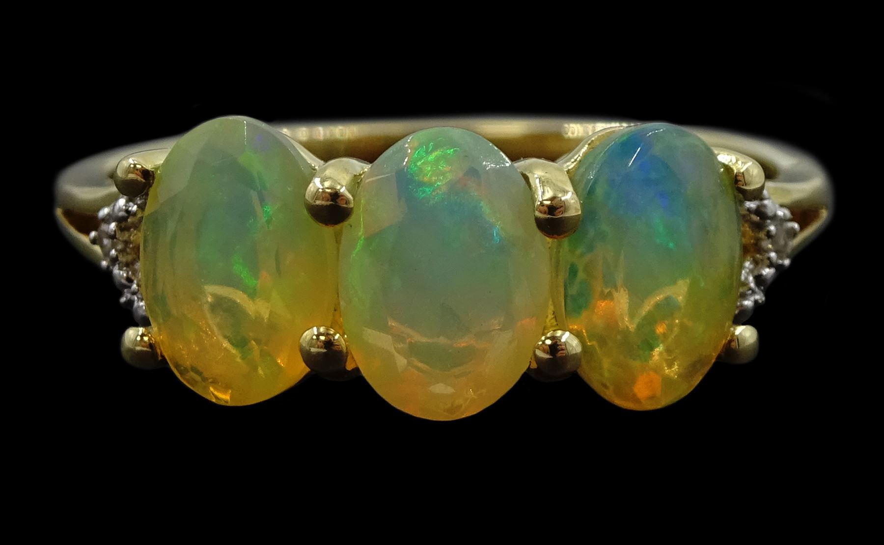 9ct gold three stone opal ring