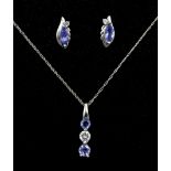 Pair of 9ct white gold tanzanite and cubic zirconia stud earrings and a similar 9ct white gold penda