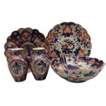Pair of Japanese Meiji ovoid form vases decorated in the Imari pallet