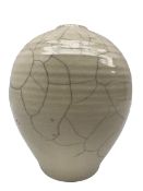 Rudie Delanghe (British 1955-): Studio pottery raku vase of ovoid form with partial crackle glaze