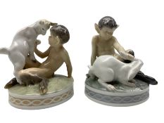 Two Royal Copenhagen figures 'Faun with Goat' no. 498 and 'Faun with Rabbit' no. 439