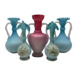 Pair of blue satin glass vases of bottle form with frilled