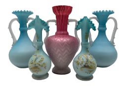 Pair of blue satin glass vases of bottle form with frilled