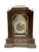 English oak cased bracket clock - in a late 19th-century case with a brass dial inscribed Thwaites