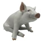 Royal Copenhagen model of a seated pig