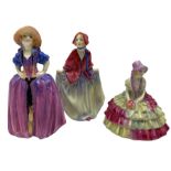 Early 20th century miniature Royal Doulton figures comprising