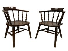 J Elliott & Son - pair early 20th century elm and beech Captains smokers bow chairs