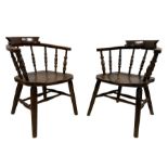 J Elliott & Son - pair early 20th century elm and beech Captains smokers bow chairs