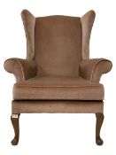 Parker Knoll - wingback armchair upholstered in light pink fabric