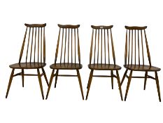 Ercol - set four mid-20th century beech and elm 'Goldsmith's Windsor Dining Chairs'