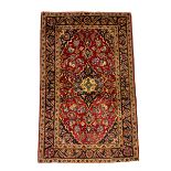 Persian red ground rug