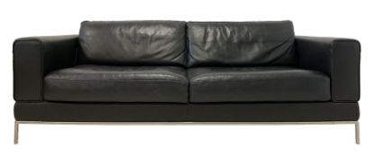 Three seat sofa upholstered in black leather