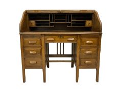 Early 20th century oak roll top knee hole desk