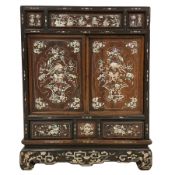 Early 20th century Chinese hardwood and mother of pearl inlaid panelled cabinet