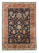 Persian design coral and blue ground rug