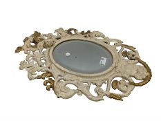 Cast metal and painted cherub mirror