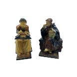 Pair of glazed Flemish figures after Achille Van De Voorde
