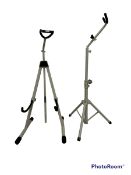 Two painted metal guitar stands (2)