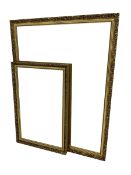 Large rectangular wall mirror with foliate patterned gilt frame and bevelled plate; with matching sm