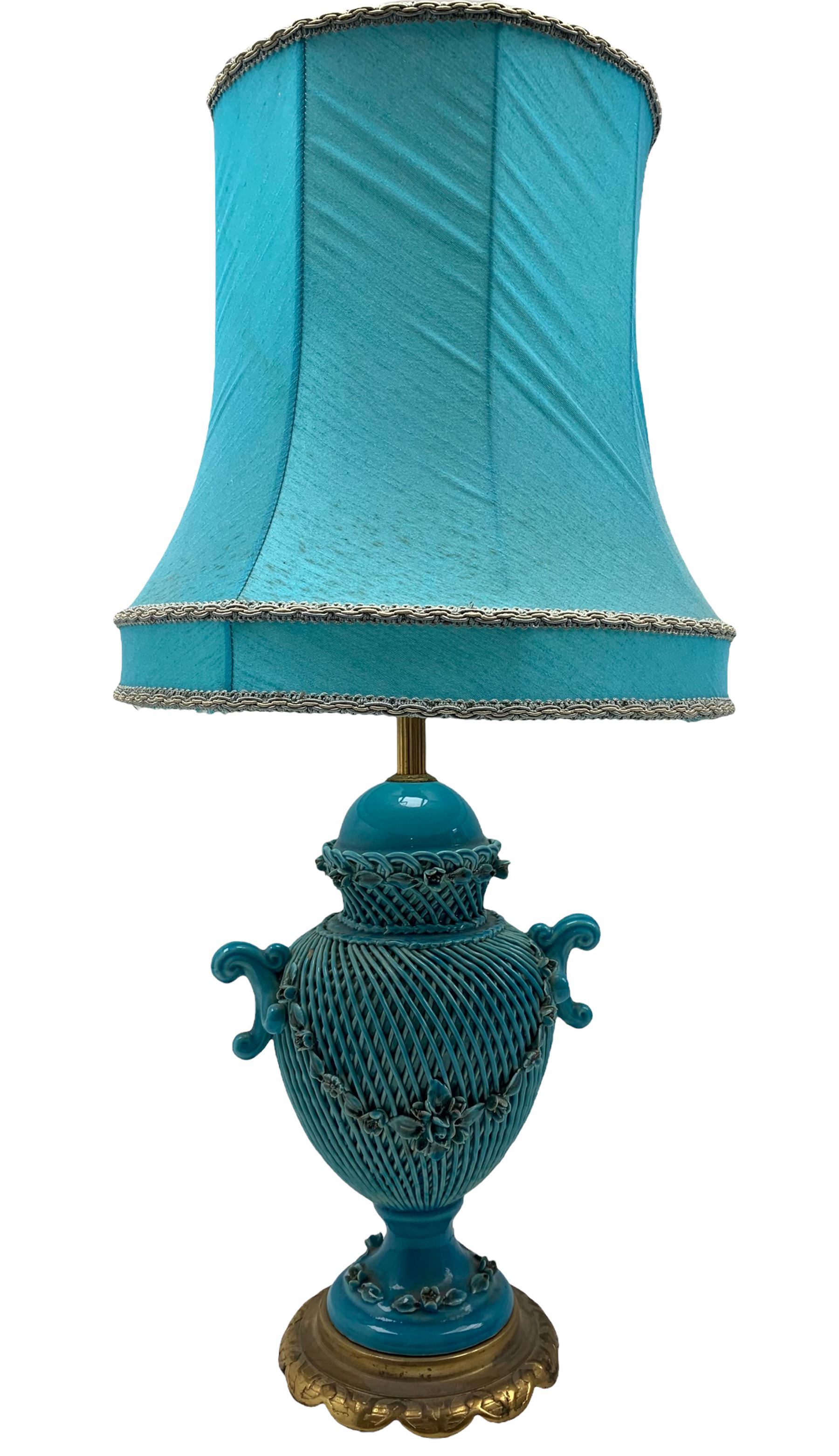 20th century continental style ceramic lamp decorated with lattice work and floral garlands on metal