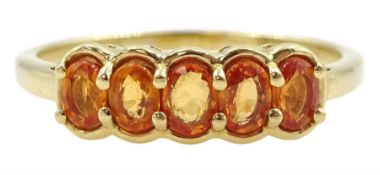 9ct gold five stone oval orange sapphire ring