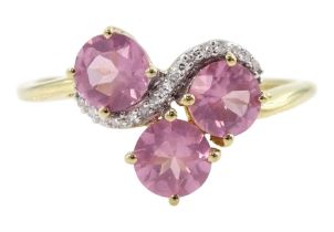 9ct gold three stone pink sapphire and diamond ring