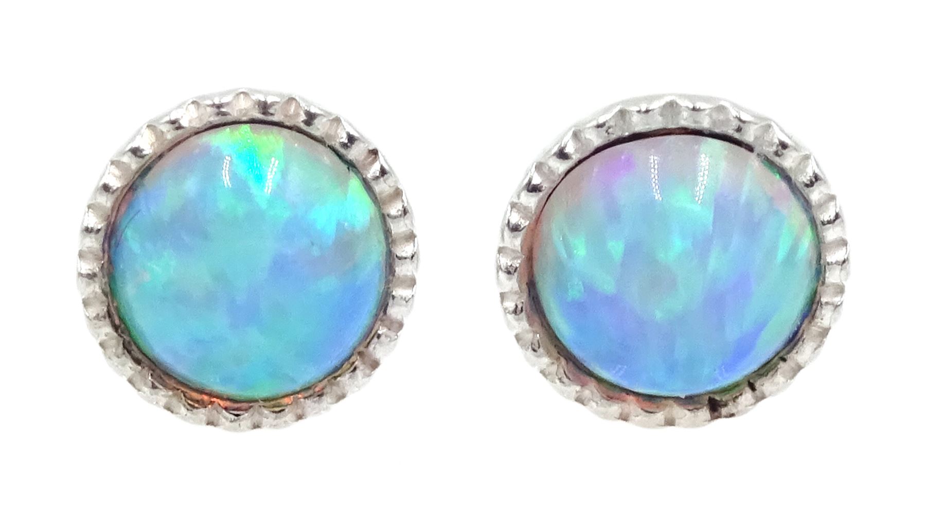 Pair of silver and opal circular stud earrings