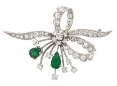 18ct white gold pear shaped emerald and round brilliant cut diamond bow brooch