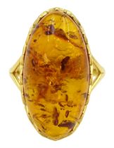 Silver-gilt oval Baltic amber ring