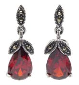 Pair of silver pear shaped red stone and marcasite pendant stud earrings