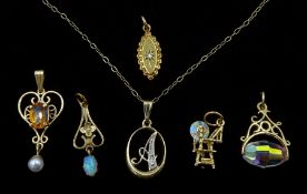 Five 9ct gold stone set pendants including diamond